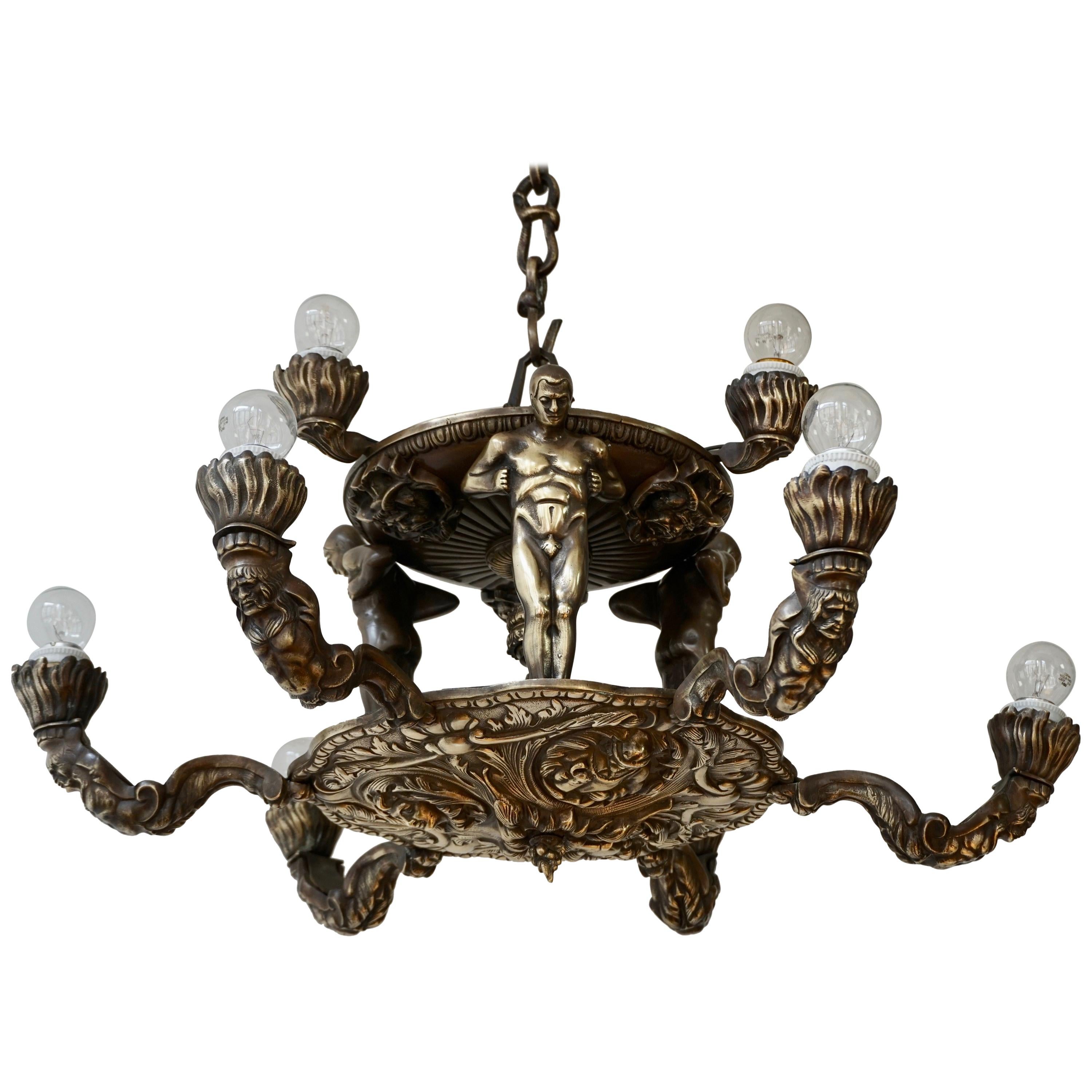 French Bronze Art Deco Hollywood Regency Chandelier Showing Male Nude Figures For Sale