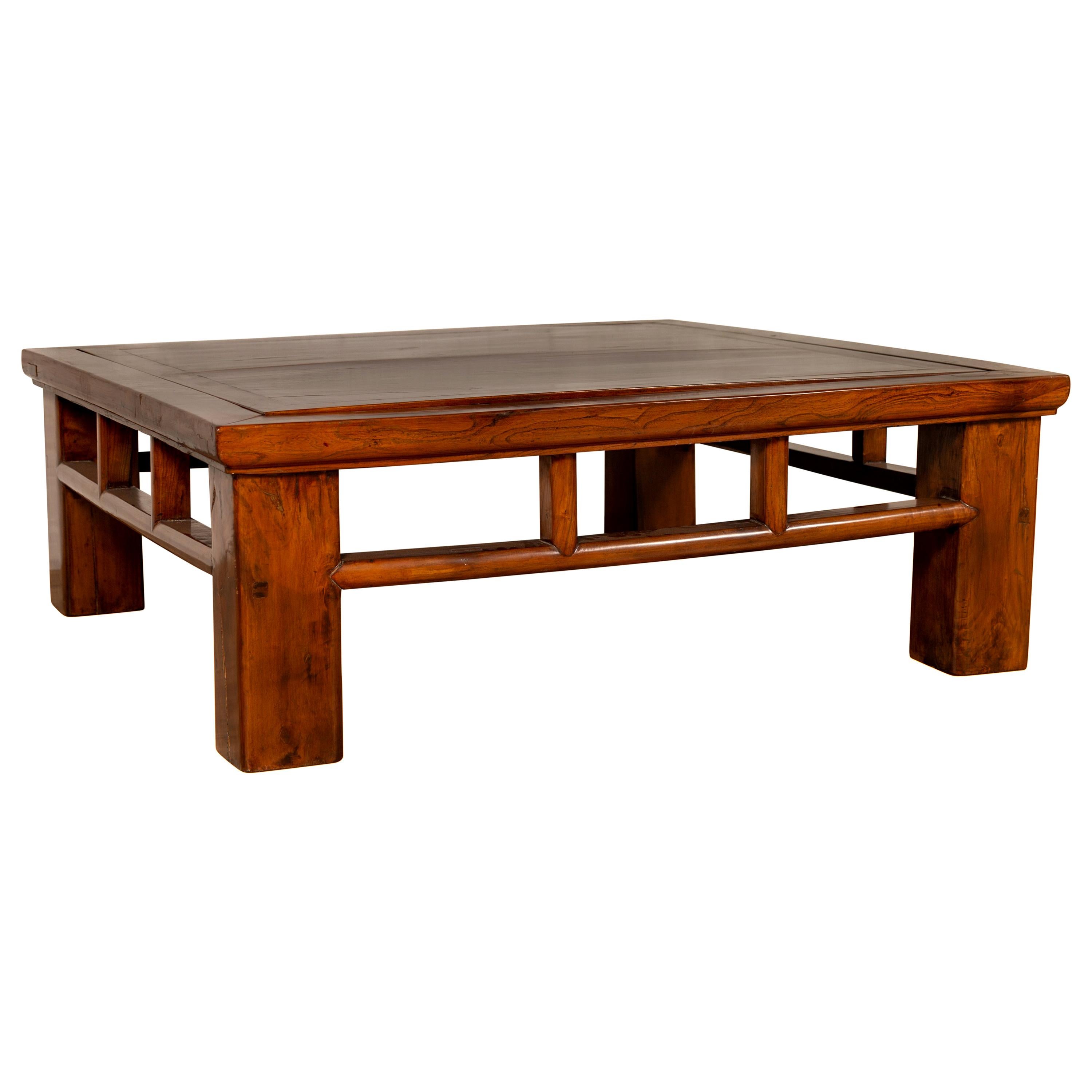 Chinese Qing Dynasty Style Elm Coffee Table with Reversible Top and Strut Motifs For Sale