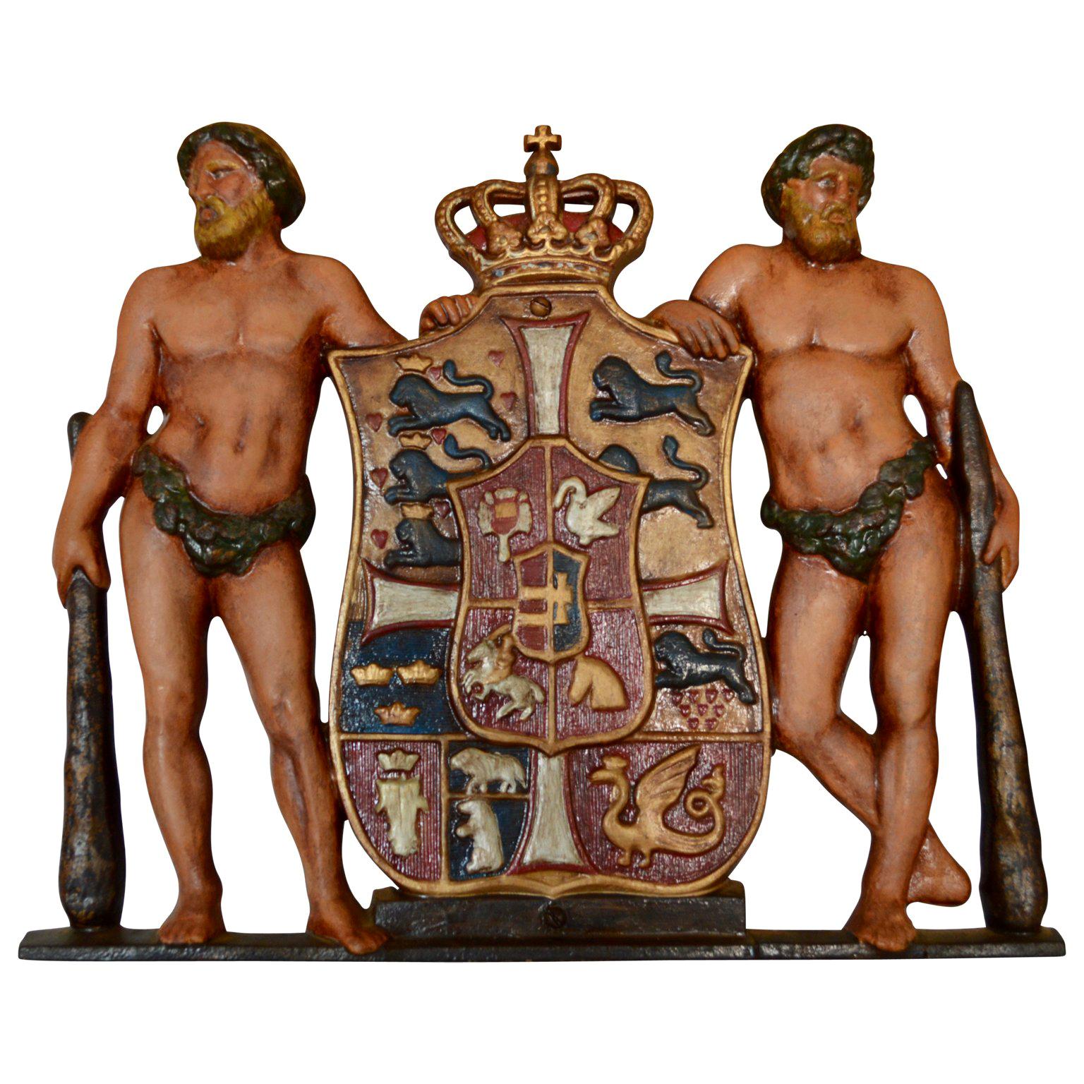 The Royal Danish coat of arms in painted on cast iron, as it was used between year 1819-1903. It was the first edition after the removal of the Norwegian lion, and the last that used the traditional Icelandic coat of arms, a crowned silver stockfish