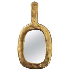 Miroir à main en céramique de forme ovale de François Lembo, "circa 1960".