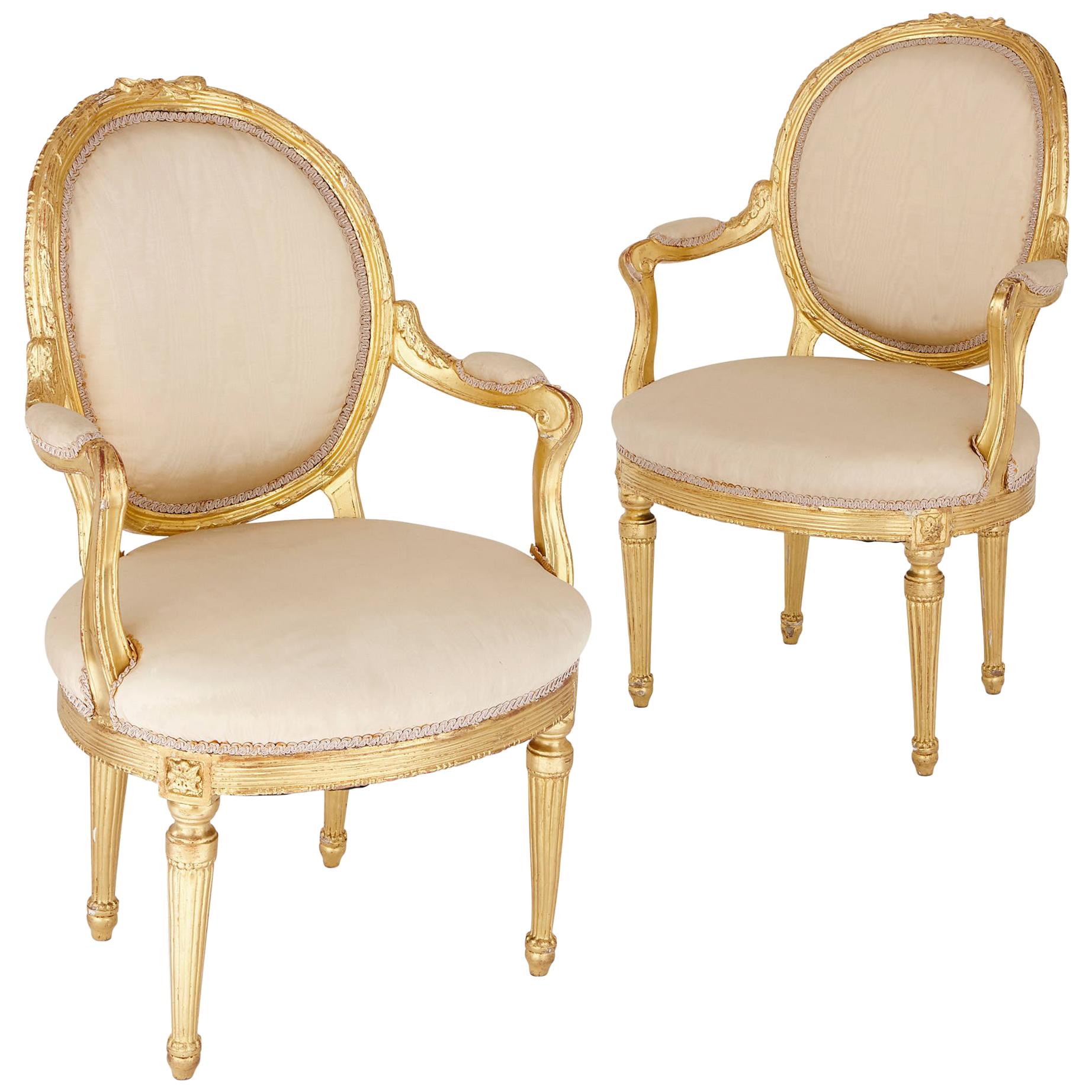 Two Louis XVI Style Giltwood Upholstered Fauteuil Armchairs