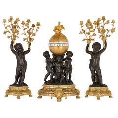 Large Patinated and Gilt Bronze Clock Set with Putti by Dasson