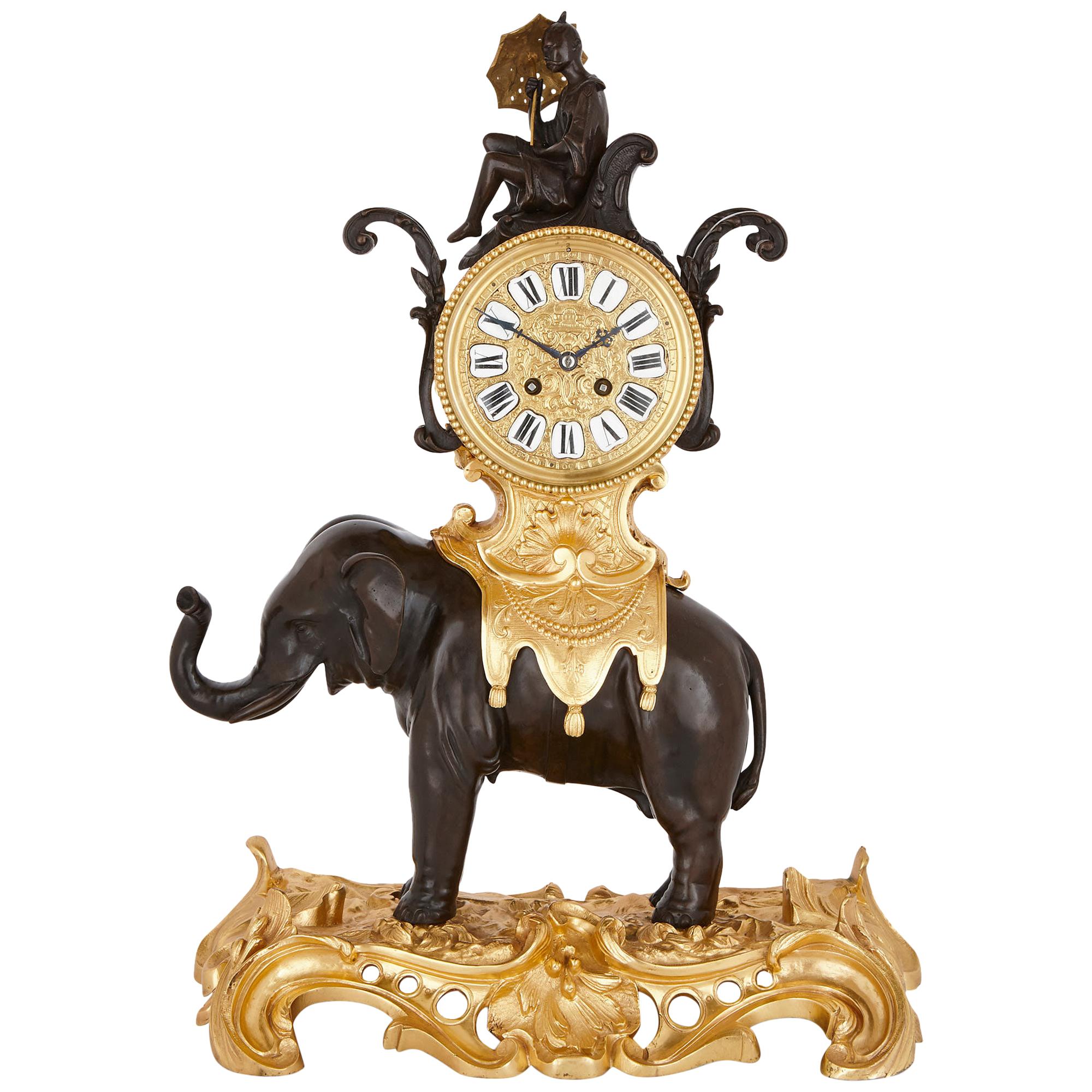 Antique Louis XV Style Patinated and Gilt Bronze Clock