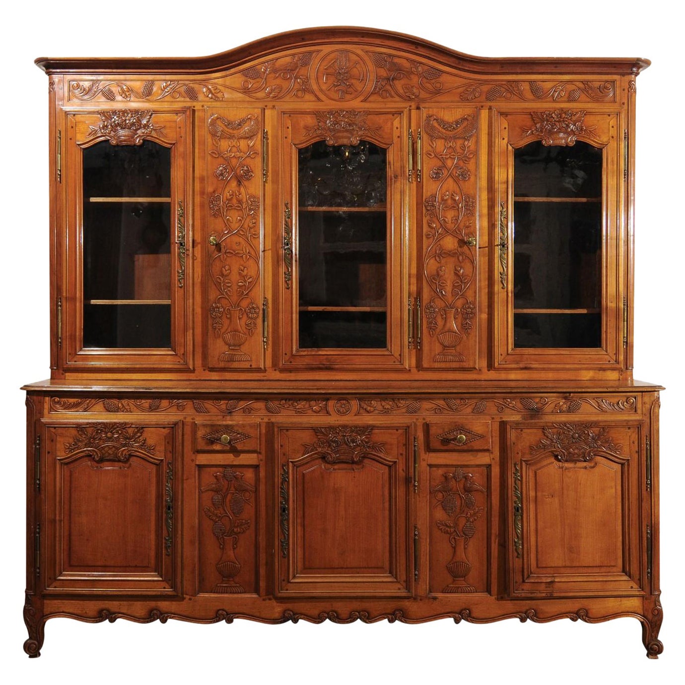 French 1820s Carved Walnut Vitrine with Glass Doors, Hidden Panels and Drawers For Sale