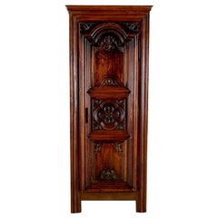 French Oak and Walnut 'Bonnetiere' with Carved Panelled Door