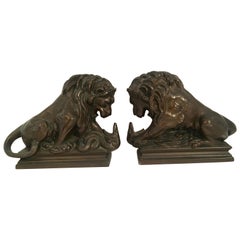 Pair of Bronze Lion Wrestling with Serpent Bookends