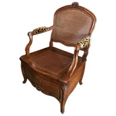 18th C. Louis XV Beach wood and Cain Arm Chair Chaise Percée Side chair. Antique