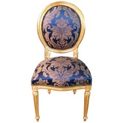 Stuhl im Louis Seize-Stil, vergoldet mit königlichem Stoff