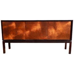 Unique and exquisite Copper Paneled Ebonized Modernist Credenza