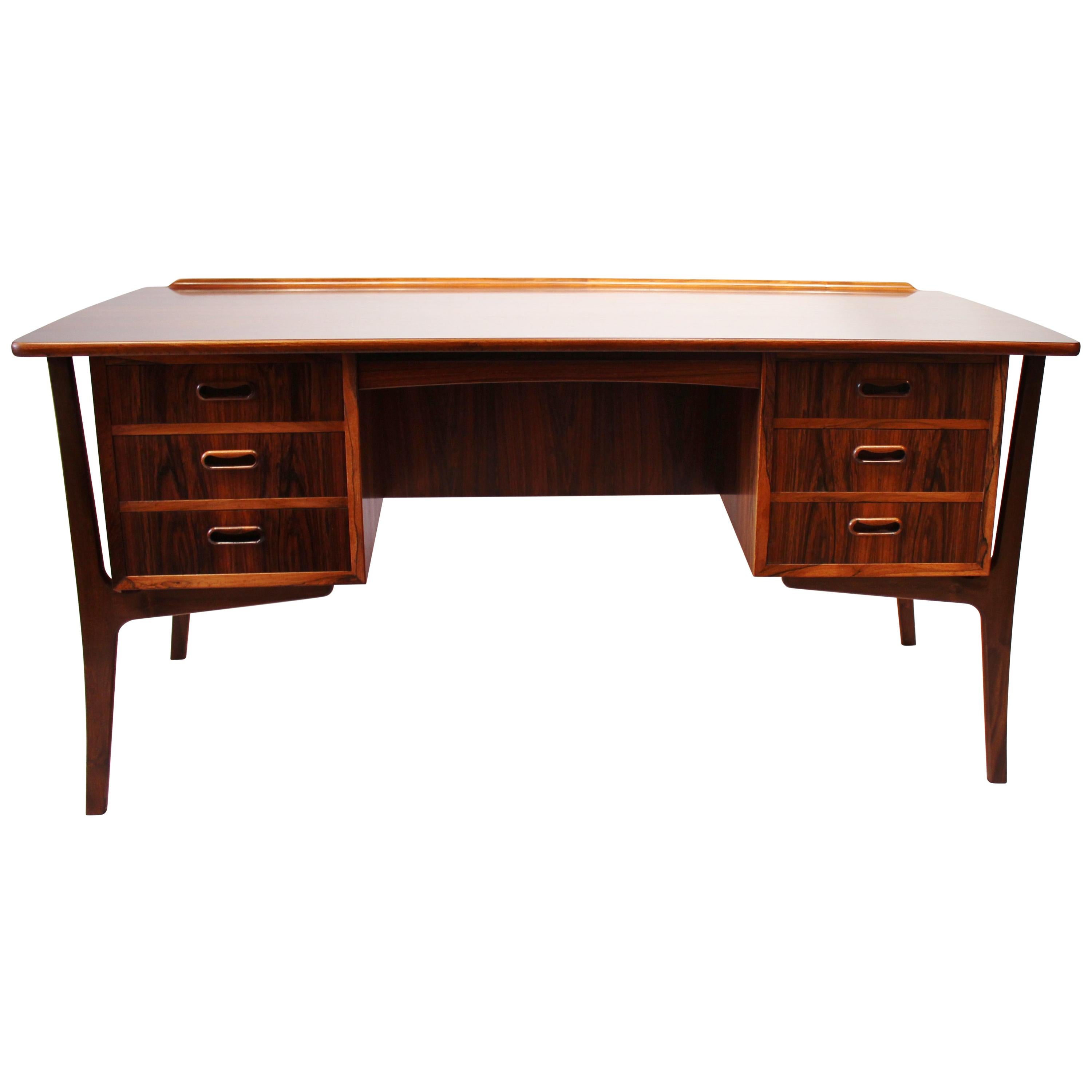 Desk in Rosewood by Svend Aage Madsen from the 1960s