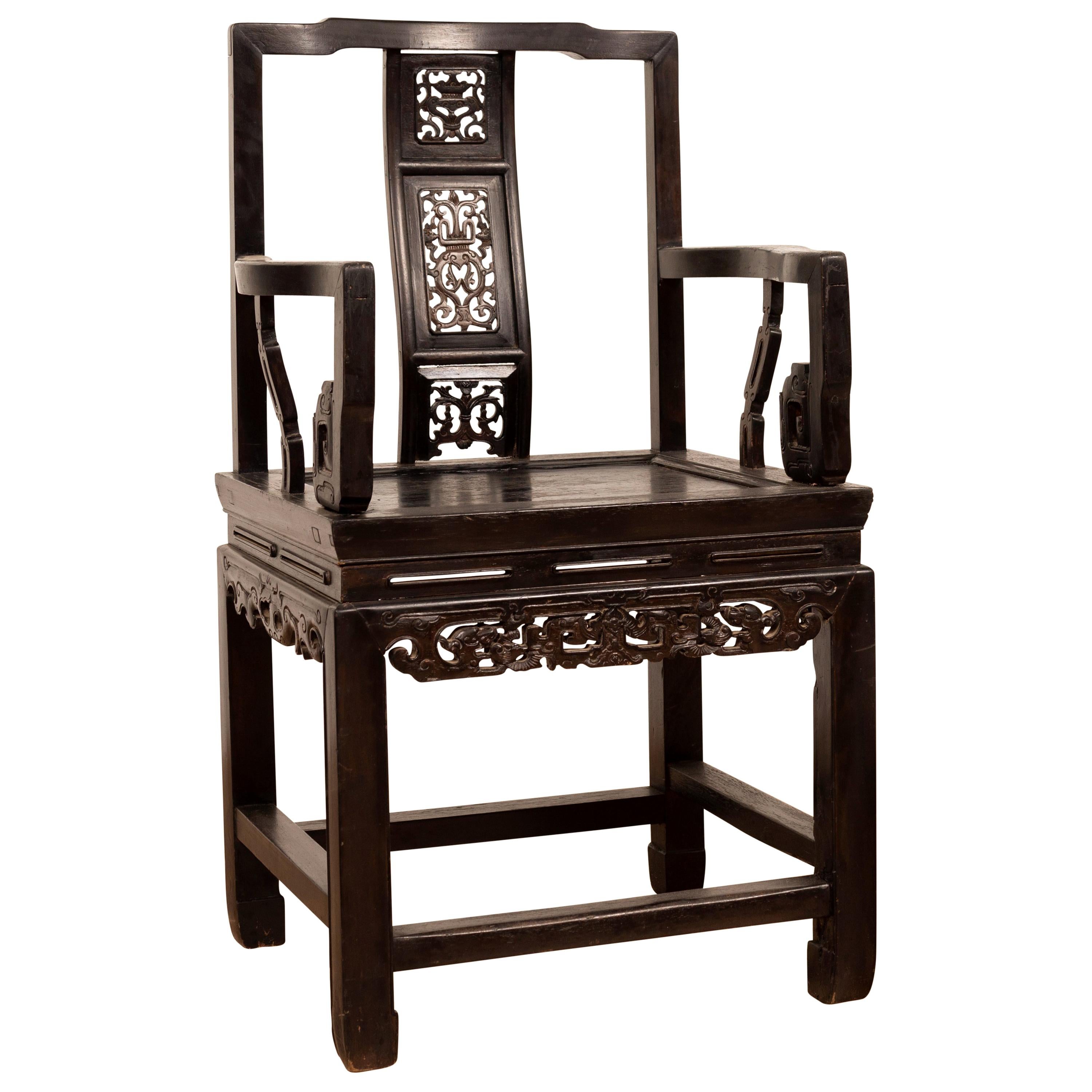 Chinese Wedding Chair with Curvy Pierced Splat, Serpentine Arms and Dark Patina For Sale