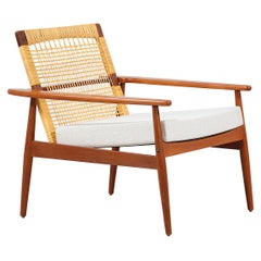 Hans Olsen Teak and Cane Lounge Chair for Juul Kristensen