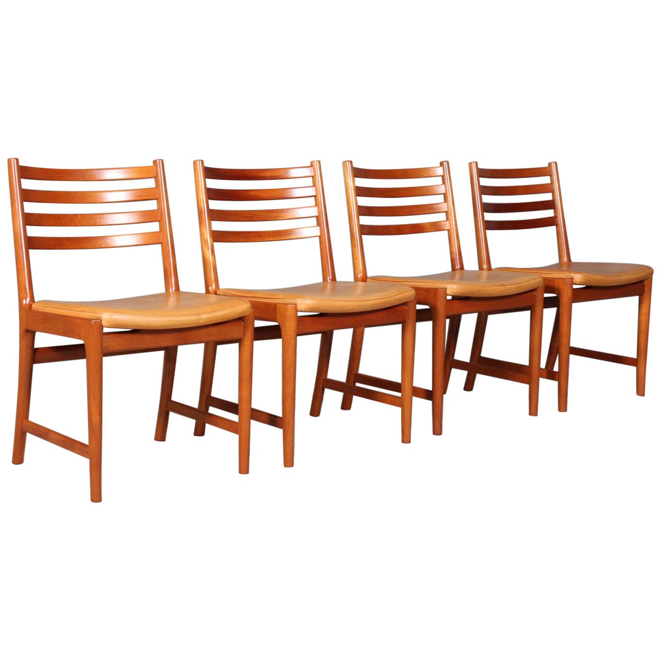 Kai Lyngfeldt Larsen four dining chairs, mahogany and original Vegetal leather.