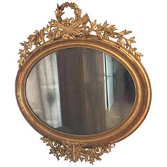 Antique Napoleon III Empire Giltwood Oval French Mercury Wall Mirror, 19th Century