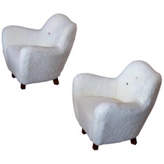 Rare Pair of Swedish Sheepskin Easy Chairs, 1950s