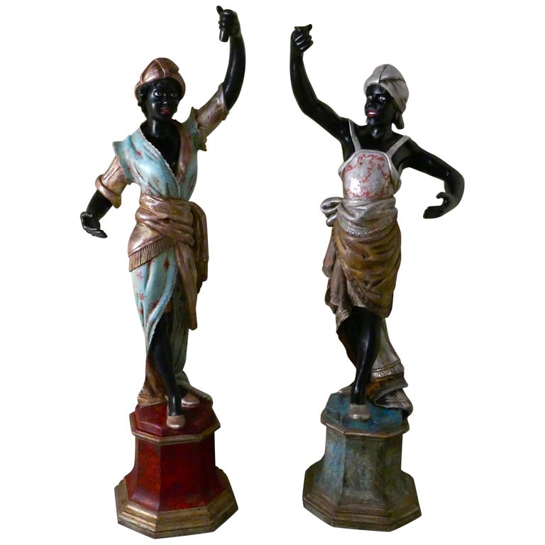 Life Size Pair of Italian Carved Wooden Statues of Nubian Slaves For