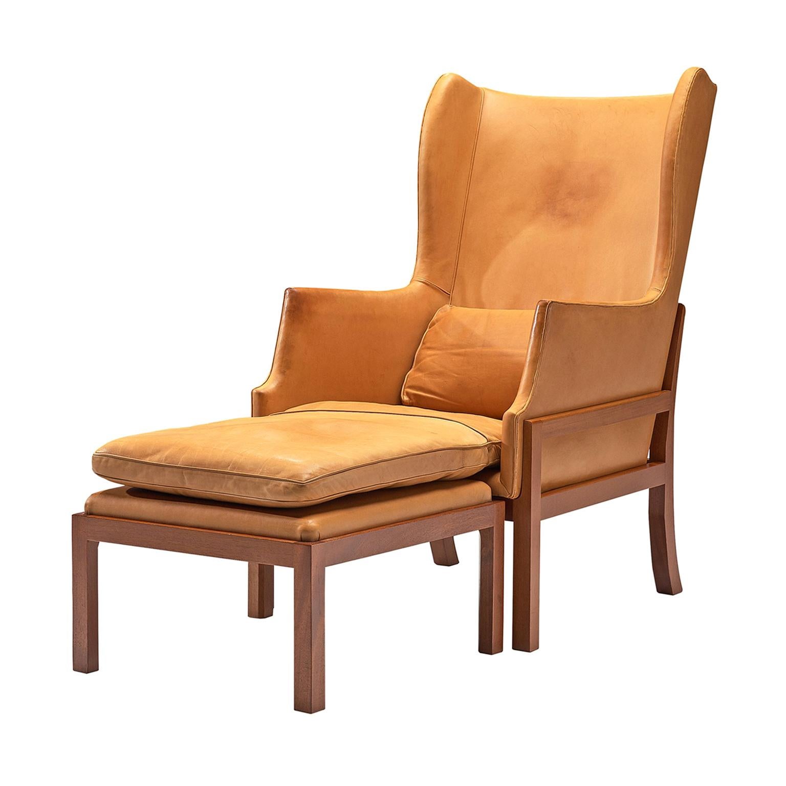Mogens Koch Wingback Wingback Chair and Ottoman in Mahogany and Cognac Leather