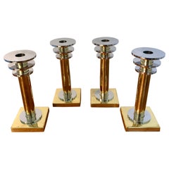 Four Modern Brass and Silver Plate Candlesticks in the Style Swid Powell