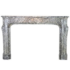 Rivestimento per caminetto classico antico del XVIII secolo in marmo belga grigio