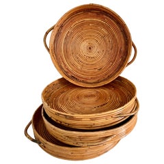 Four Rattan Serving Trays
