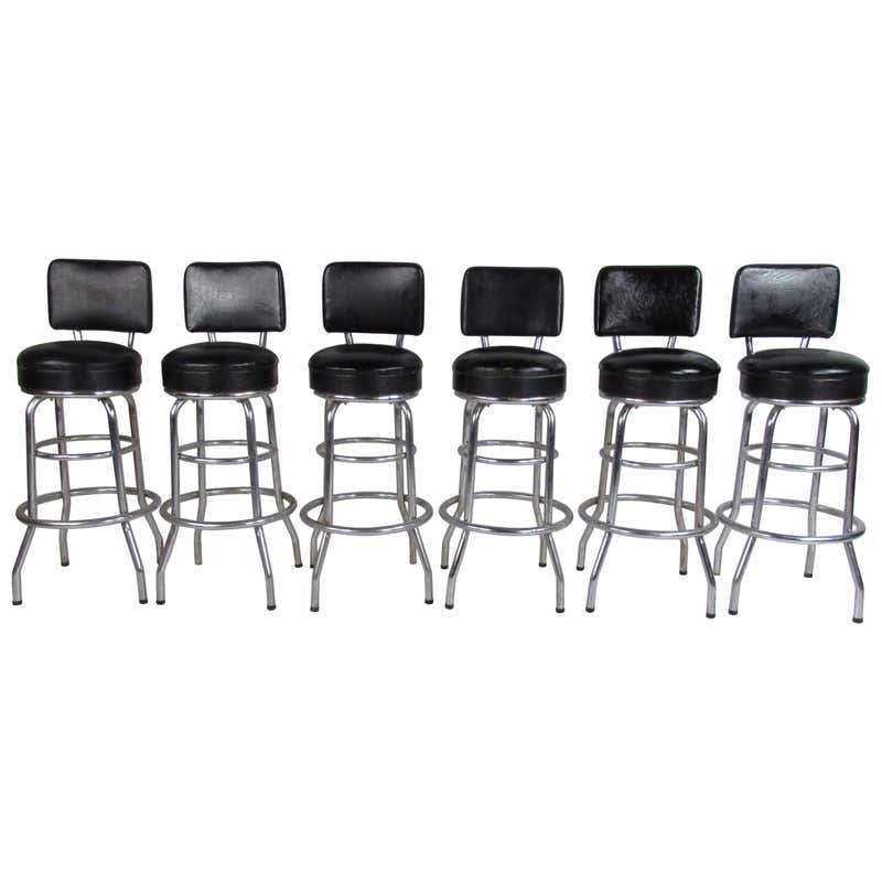 Four Mid-Century Black Leather Bar Stools at 1stdibs