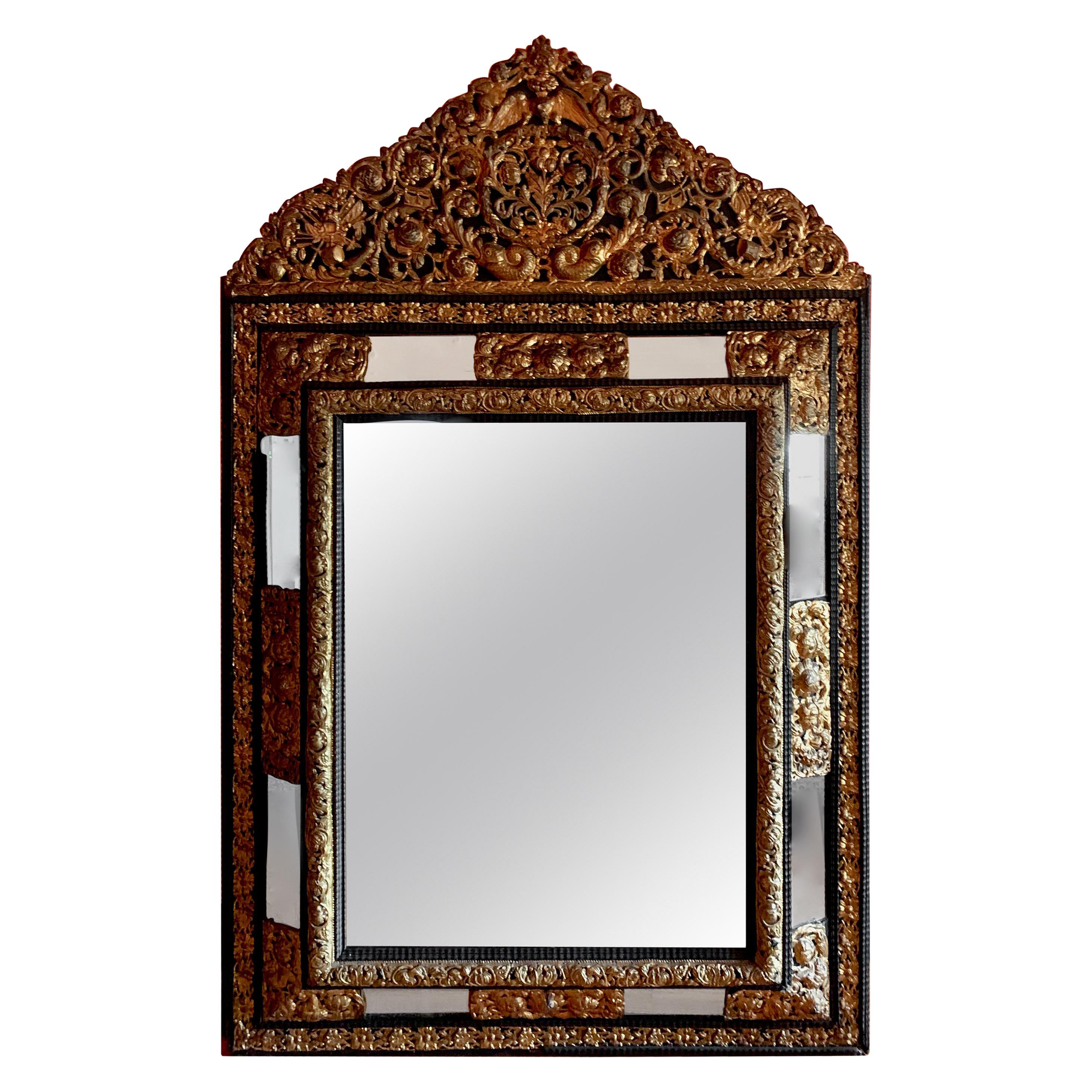French Ebony Repousse Brass Mirror with Beveled Glass