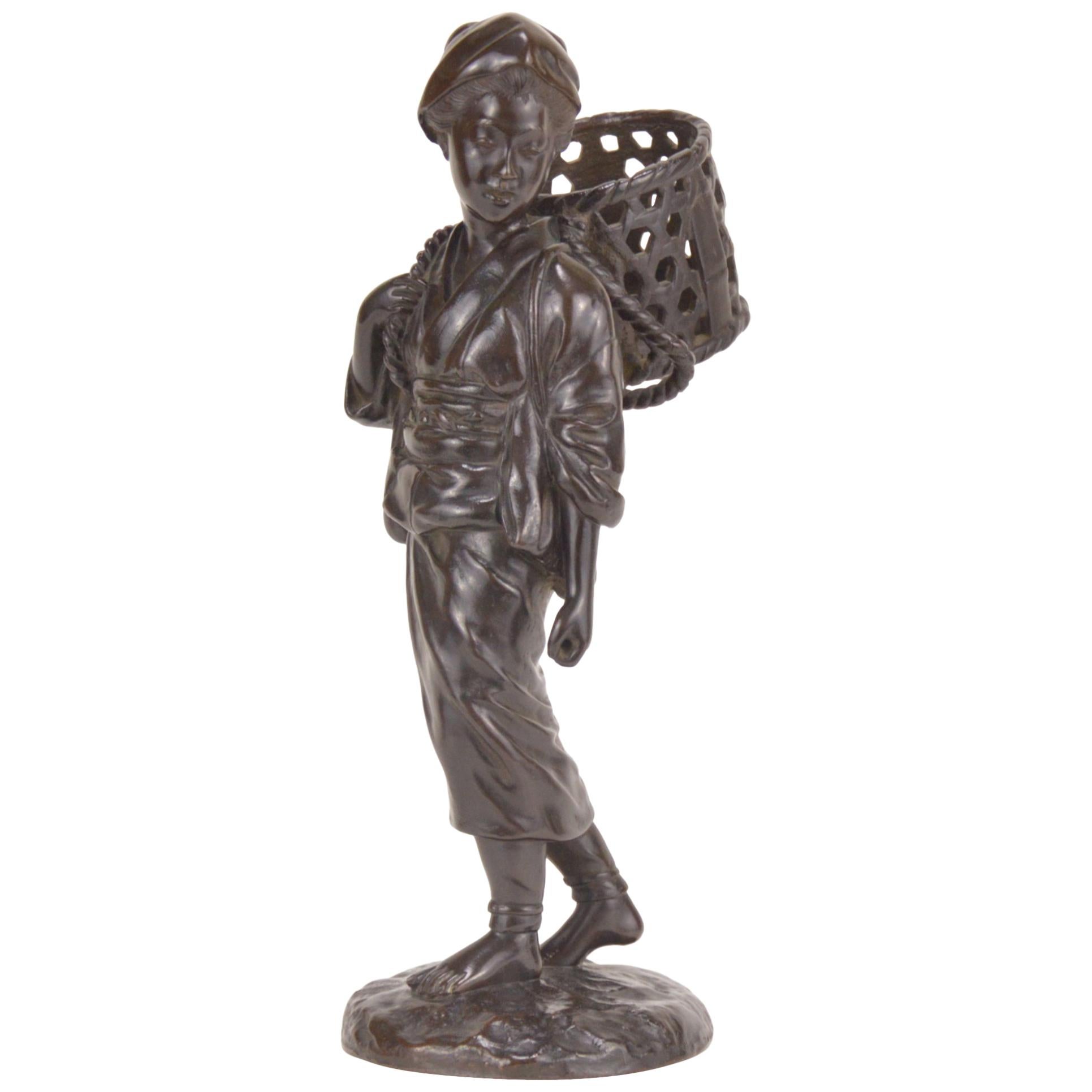 Patinated Bronze Statue Representing a Peasant Girl Holding a Basket Japan, 1900 For Sale