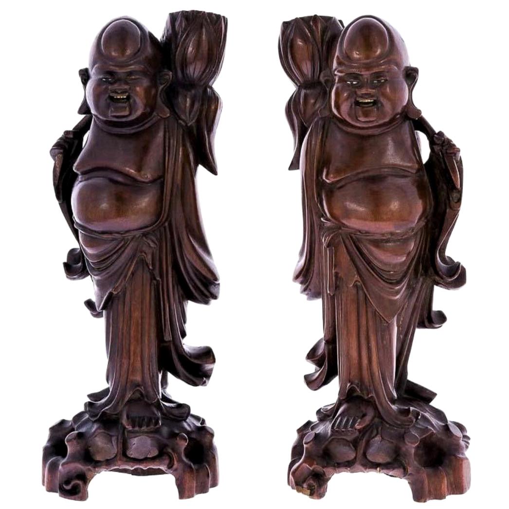 Early 20th Century Pair of Carved Tamarind Wood Buddha Candleholders
