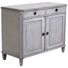 Richly carved Gustavian style two-doors sideboard, 19th Century