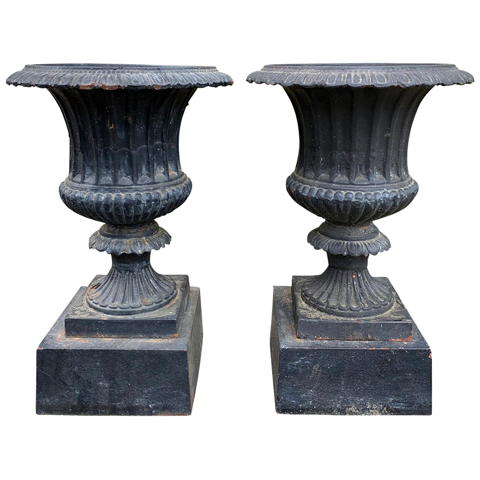 Pair of Neoclassical Iron Urns with Stands, circa 1900