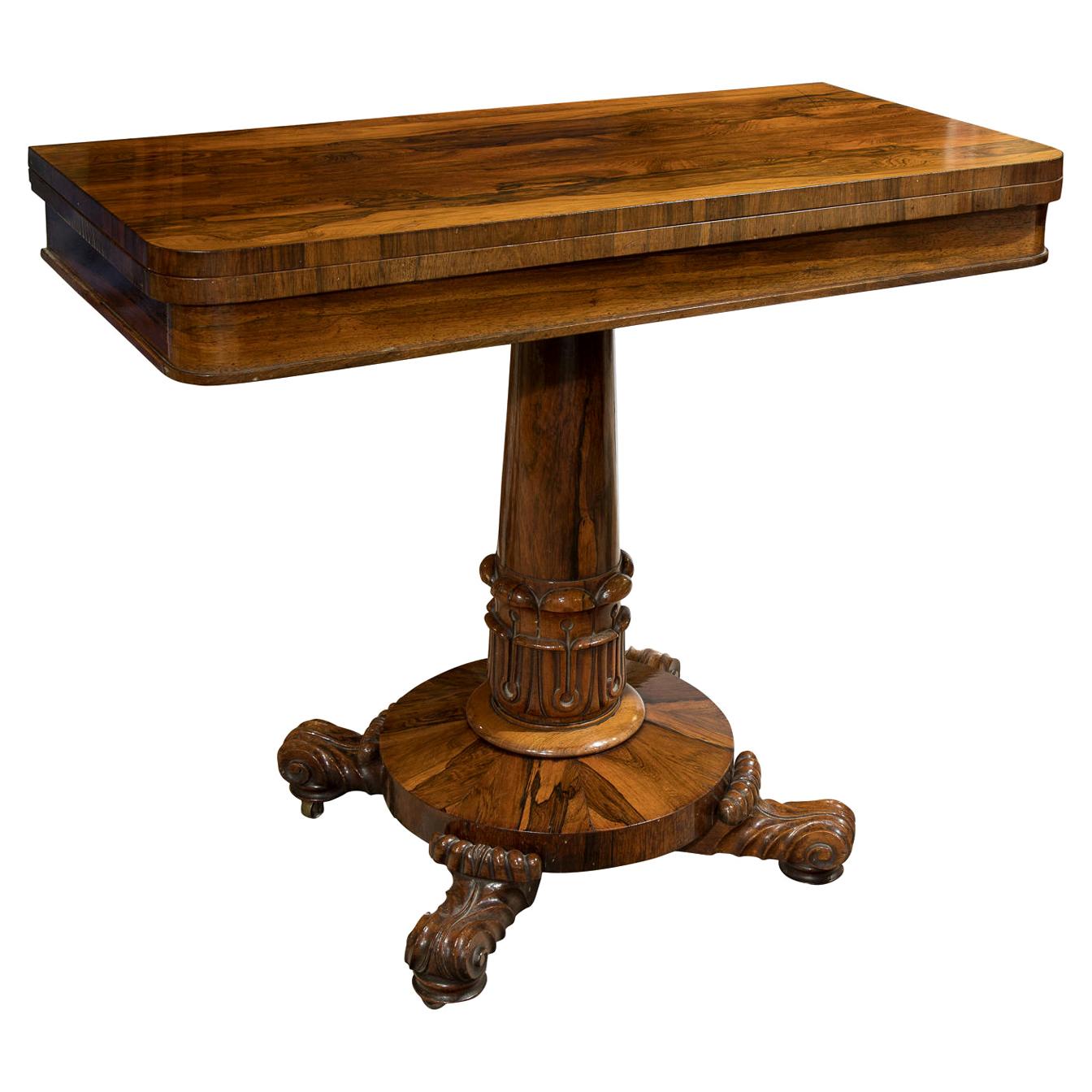 William IV Rosewood card table standing on a central pedestal and carved base For Sale
