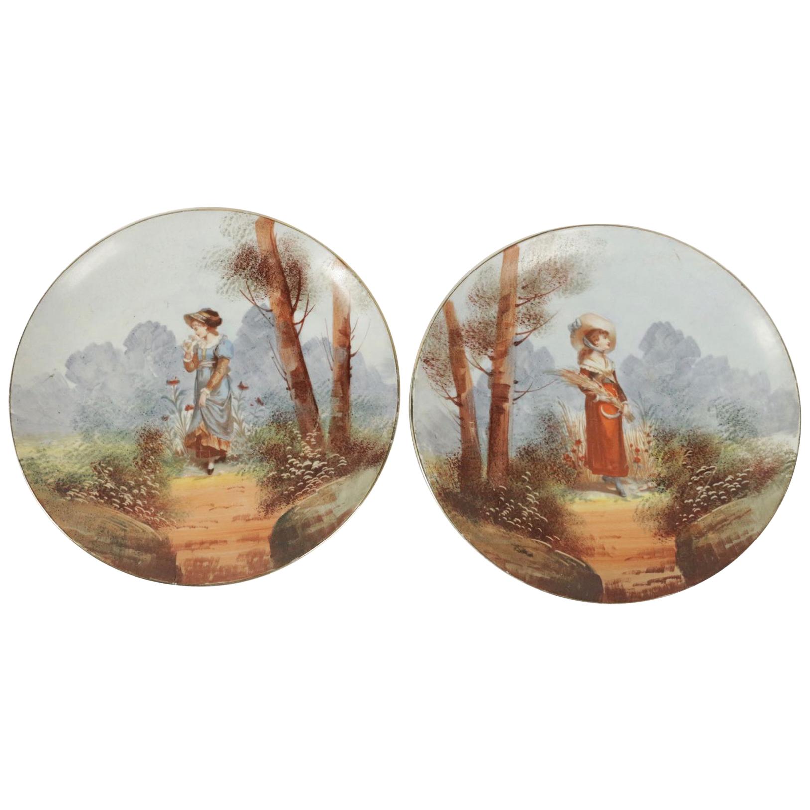 Paar französische, handbemalte Porzellanteller aus dem 19. Jahrhundert