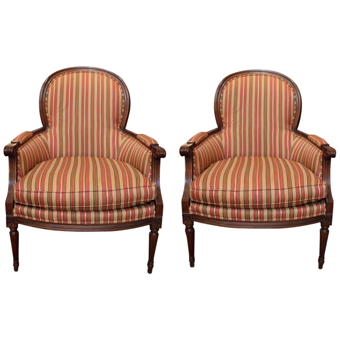 Pair of Carved Walnut Bergère Chairs
