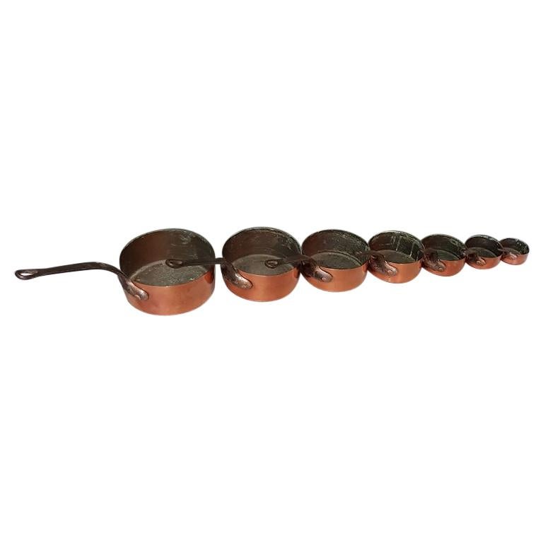 First Half of the 20th Century French 7-Piece Copper Pan Set For Sale