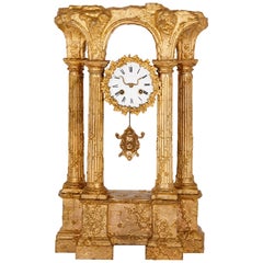 Gilt bronze mantel clock in form of Roman ruin