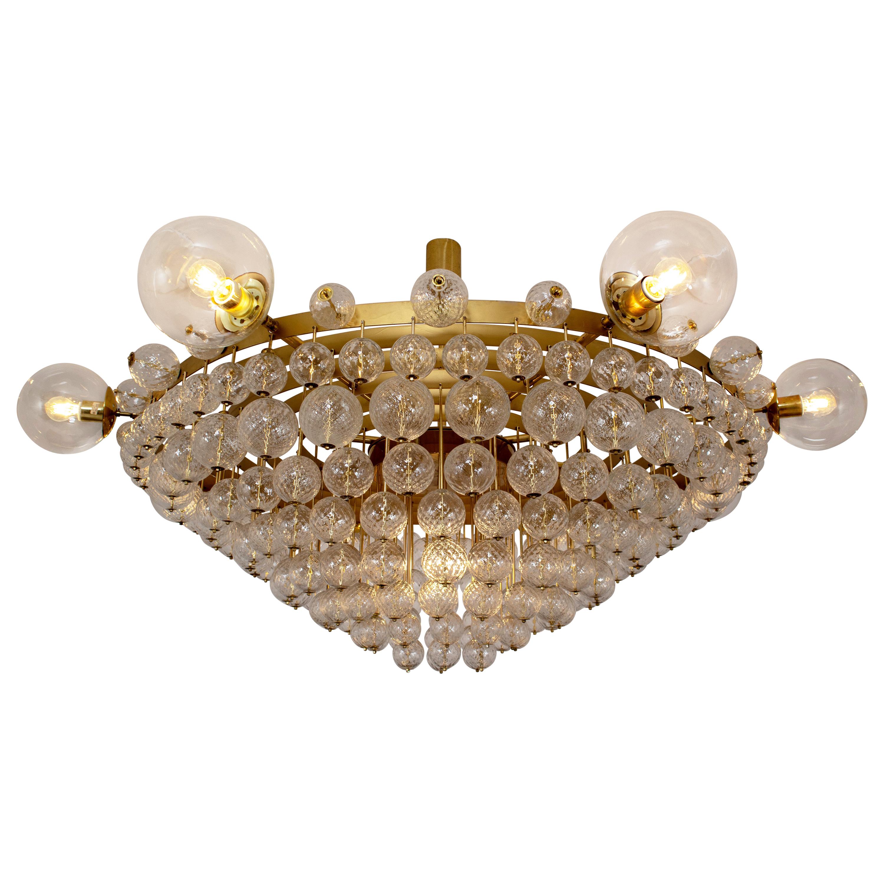 Extremely Large Hotel Chandelier with Brass Fixture and Structured Glass Globes