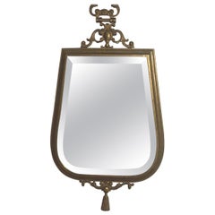 Mid-Century Modern Brass Wall Mirror in the style of Fonasetti, Milano. 1950s