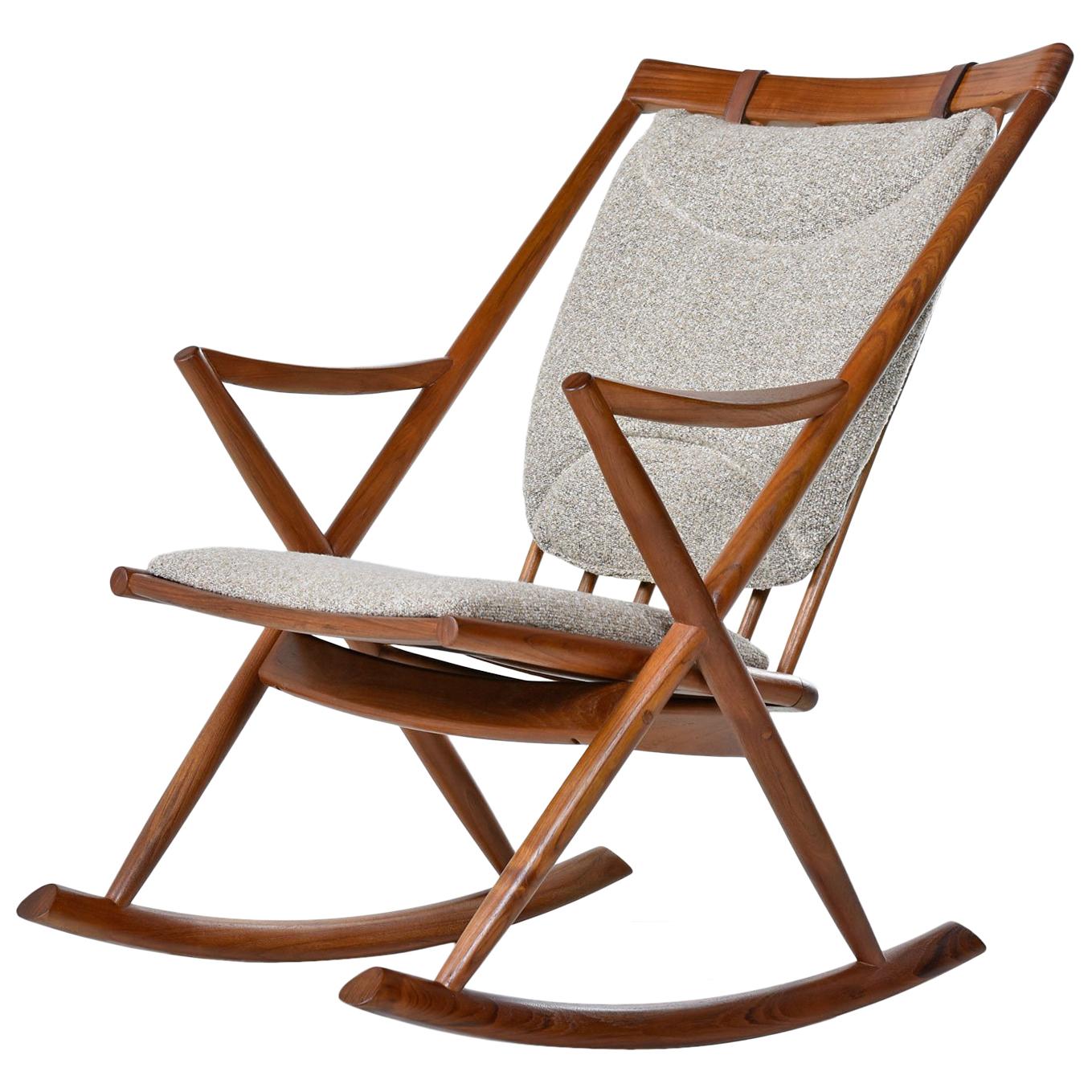 This teak frame has been restored to excellent condition. Combined with the newer fabric, this chair looks like it did in the 1960s. Please inspect our close-up pictures to appreciate the quality difference between us and everybody else. We're