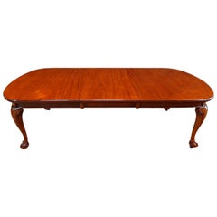 English Edwardian Mahogany Claw and Ball Extending Dining Table. 20th.century