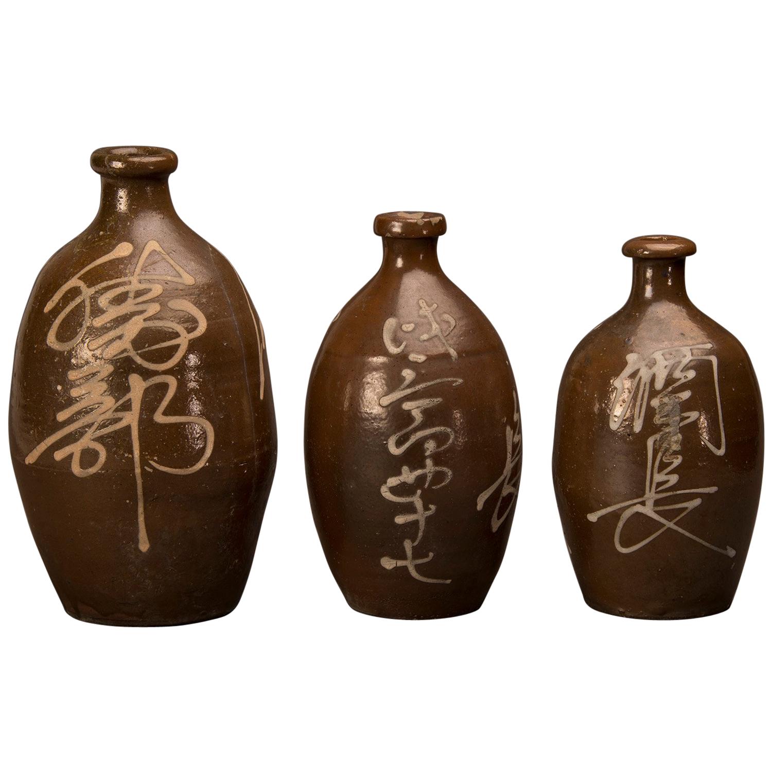 Set of Three Antique Japanese Sake Saki Bottles with Calligraphy, circa 1900 For Sale
