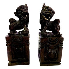 Pair of Hand Carved Chinese Wood Carved, Bone Inlay Foo Dogs, circa Early 1900s