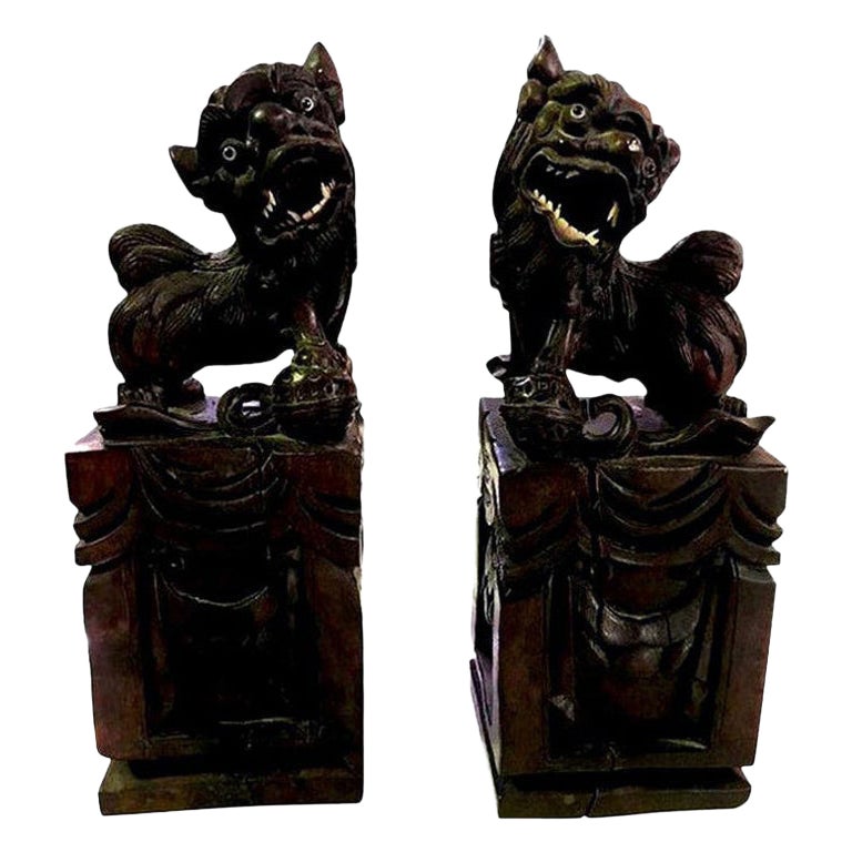 Pair of Chinese Hand Wood Carved, Bone Inlay Foo Dogs, circa Early 1900s