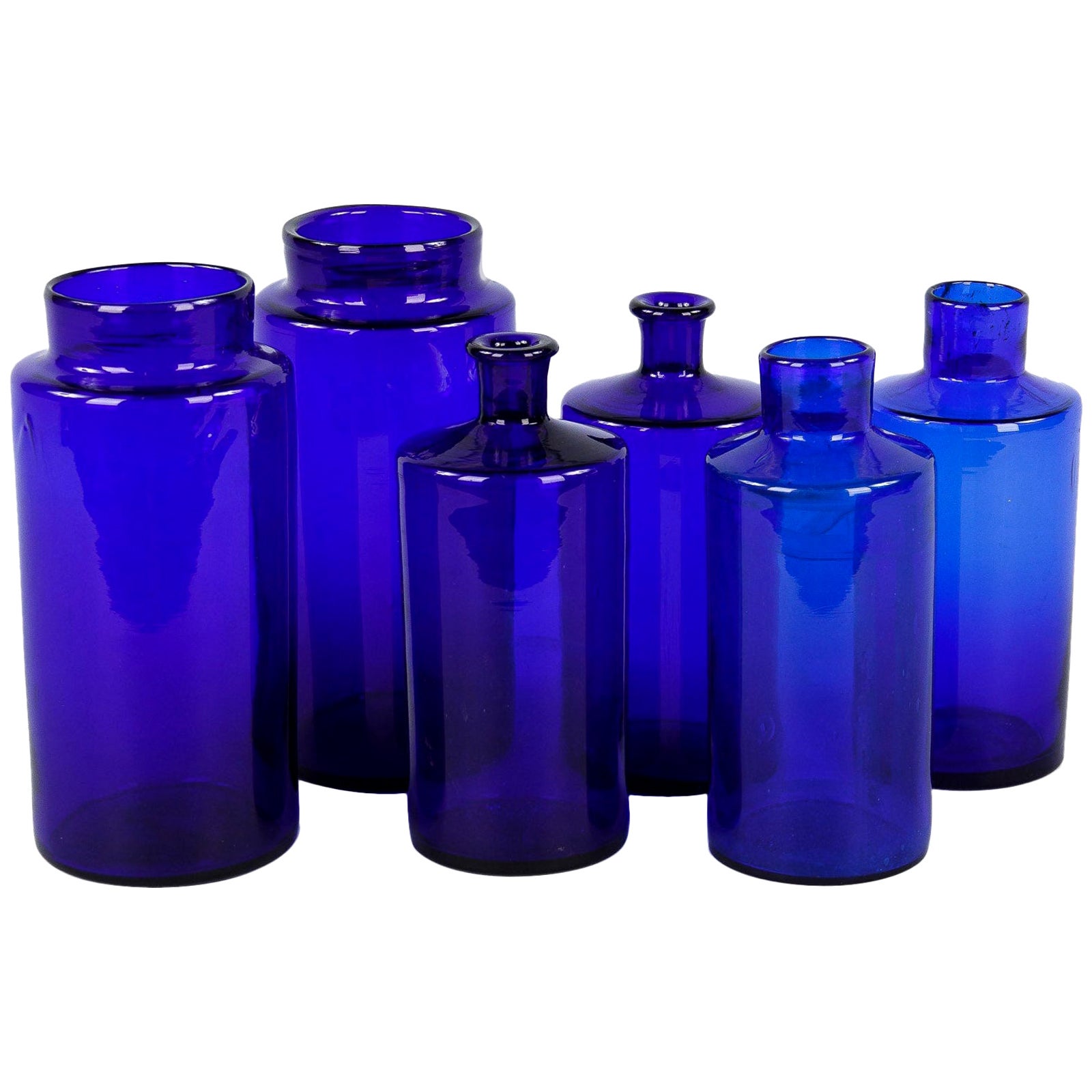 Collection of Three Rum and Brandy Early Cobalt Blue Bottles For Sale