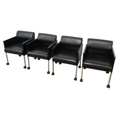 Set of 4 Black Lacquered and Leather Armchairs on Casters by Rosenthal. Cir 1970