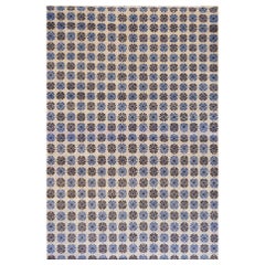 Tappeto contemporaneo in lana intrecciata a mano di ispirazione Khotan floreale blu e marrone