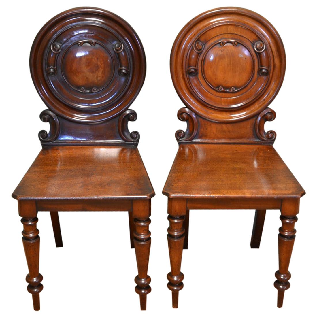 Unusual Pair Of Moulded Back Antique Mahogany Hall Chairs For Sale