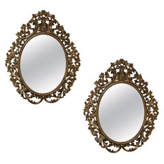 Pair of 19th Century English Carved Giltwood Oval Mirrors
