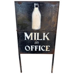 Vintage Newspaper and Milk Trade Sign