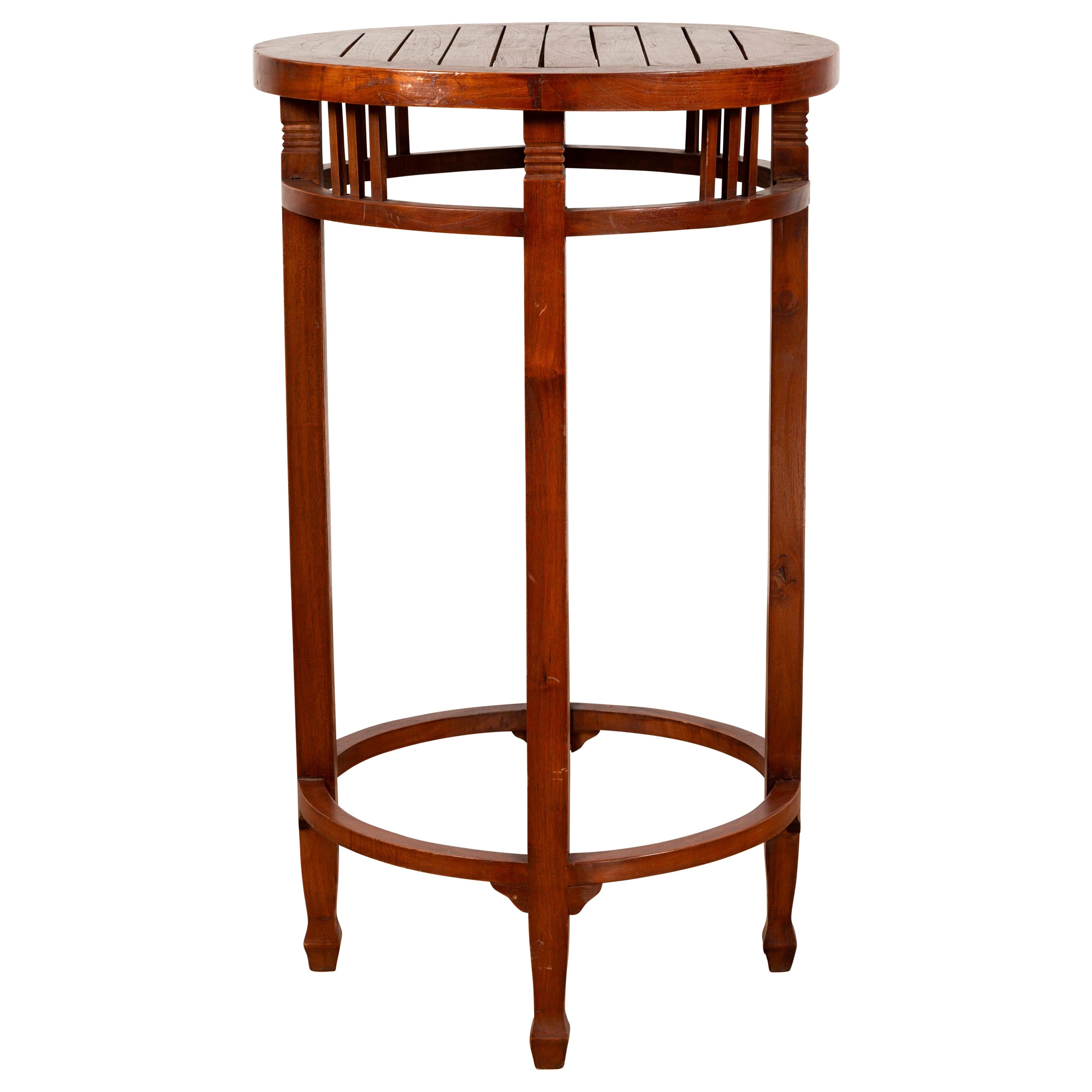 19th Century Indonesian Round Pedestal Table with Pierced Apron and Stretchers For Sale