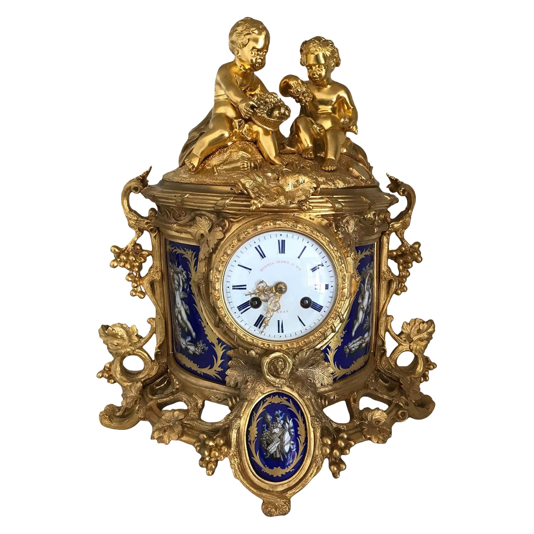 Reloj de chimenea de bronce, vendido por Howell James Londres y París, siglo XIX